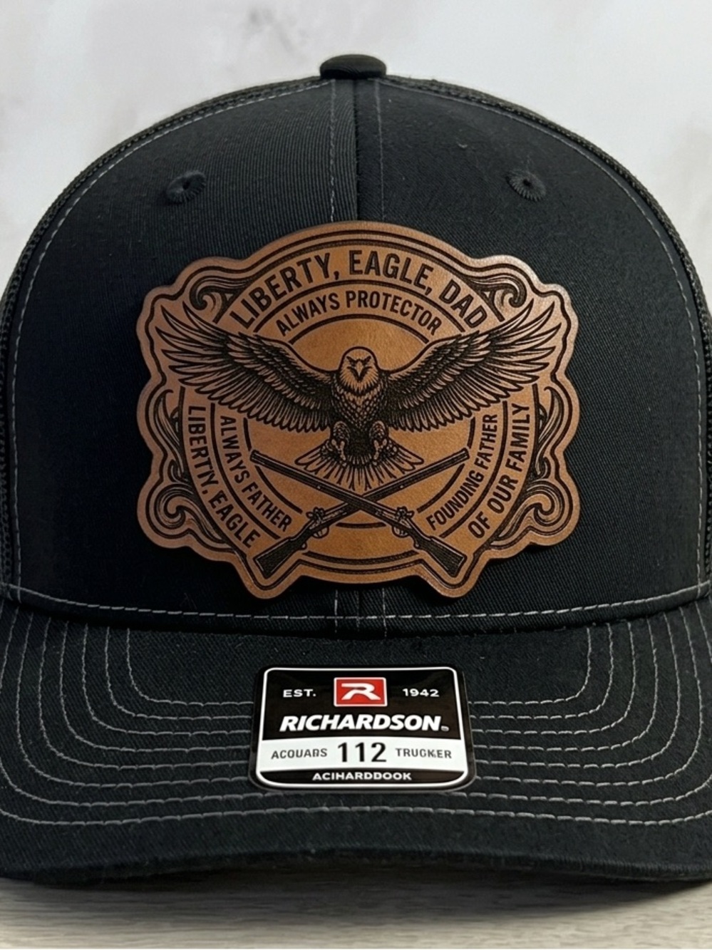 Richardson Black Trucker Hat with fathers Day Leather Patch